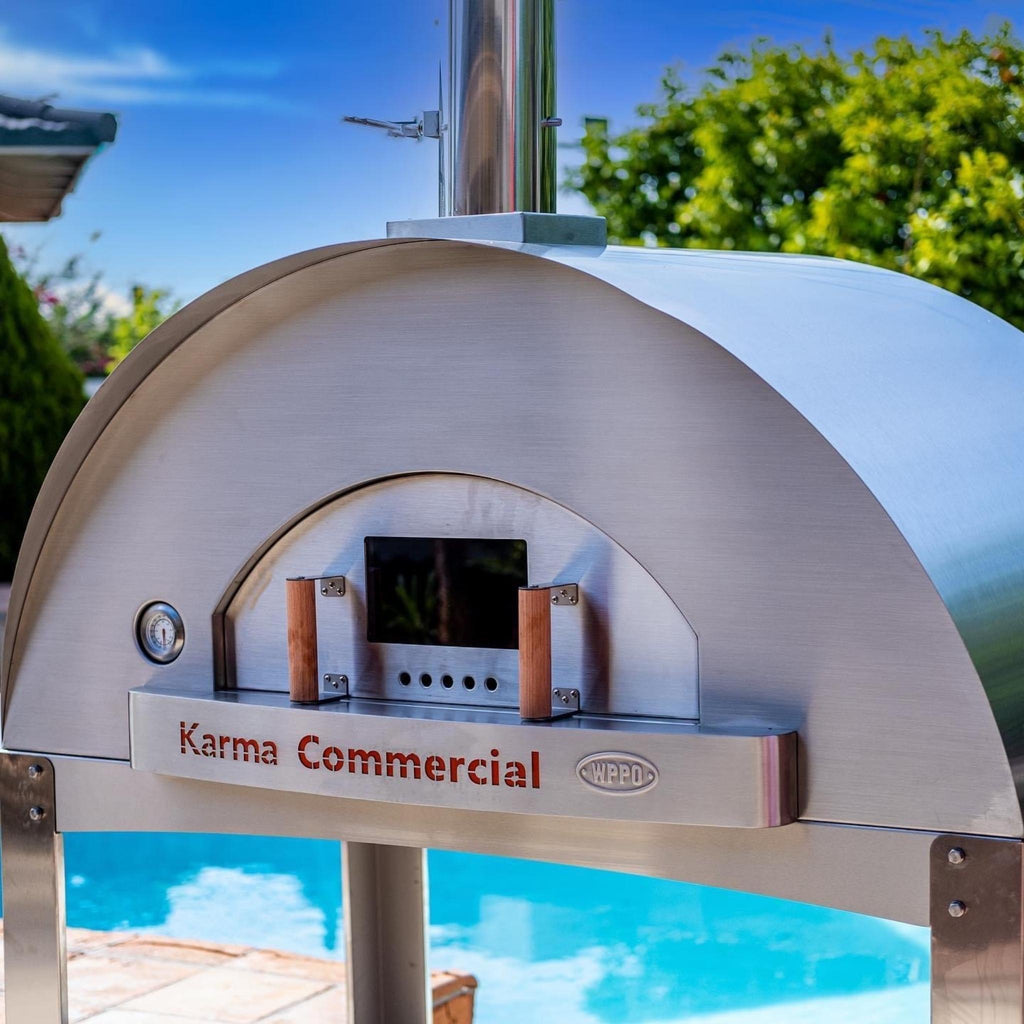 WPPO Karma 55-inch commercial wood-fired pizza oven with stainless steel construction and built-in temperature gauge