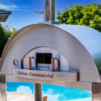 WPPO Karma 55-inch commercial wood-fired pizza oven with stainless steel construction and built-in temperature gauge