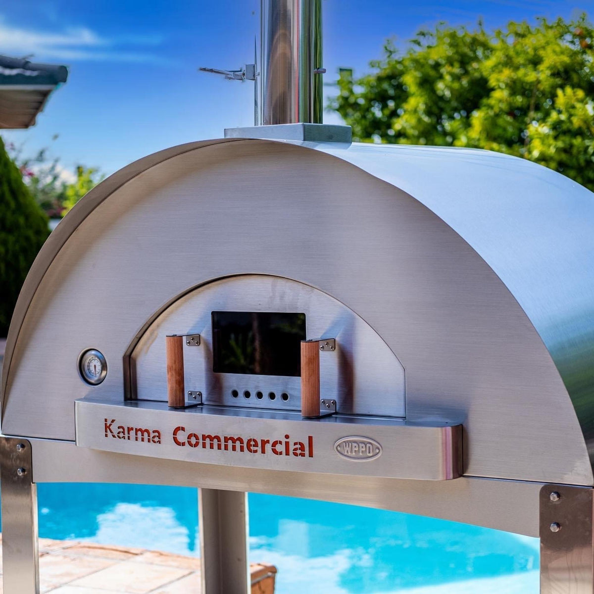 WPPO Karma 55-inch commercial wood-fired pizza oven with stainless steel construction and built-in temperature gauge