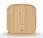 ALEKO Arnica 6-Person Rustic Cedar Outdoor Sauna rear view showing solid cedar construction, rounded cabin design, and rear ventilation openings