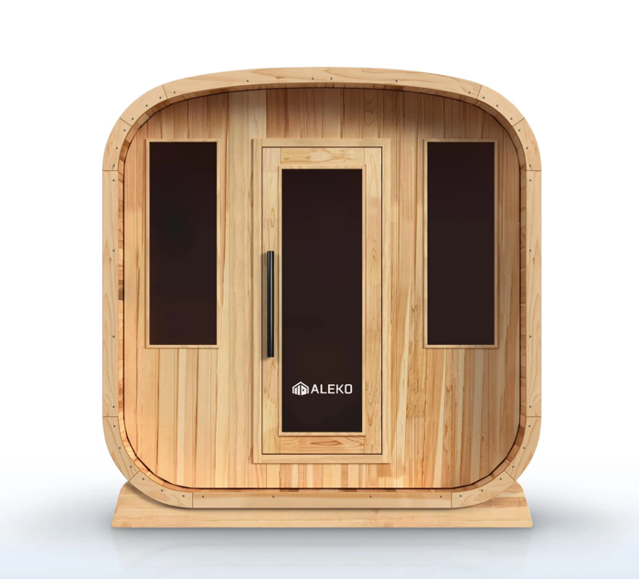 ALEKO Arnica 6-Person Rustic Cedar Outdoor Sauna front view with rounded cedar cabin, tinted glass door, side windows, and black trim