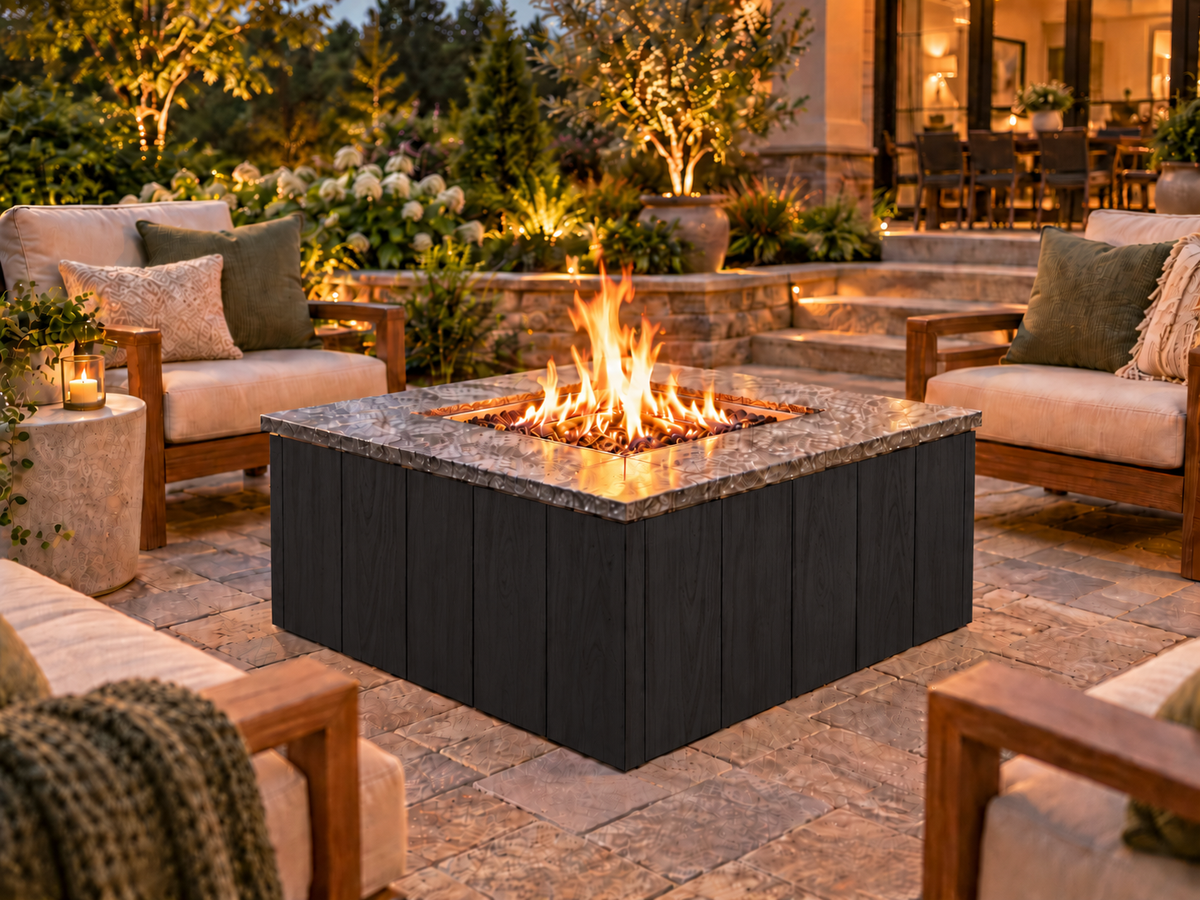 Firefly 36-inch square fire pit with Black 140 cladding on a landscaped outdoor patio