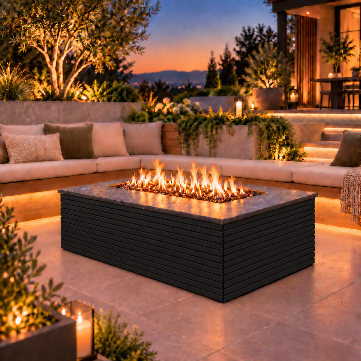EZ Finish Firefly 48 x 32 rectangular fire pit with Black 2+2 horizontal cladding on a landscaped patio at dusk.