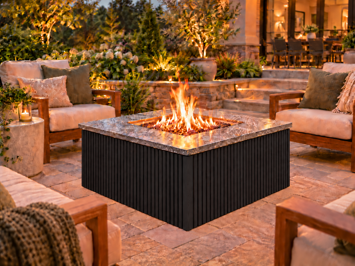 Firefly 36-inch square fire pit with Black 2+2 cladding on a landscaped outdoor patio