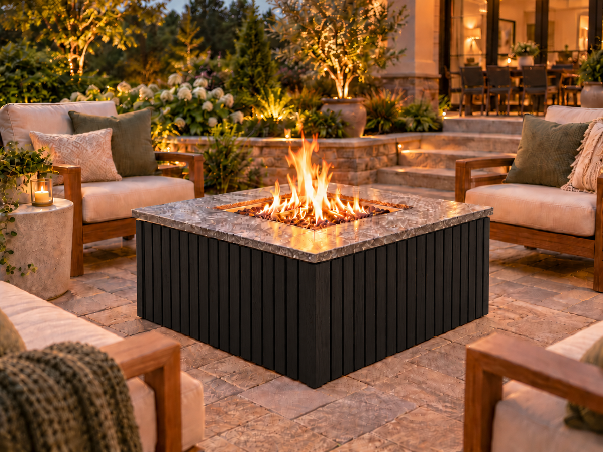 Firefly 36-inch square fire pit with Black 4+4 cladding on a landscaped outdoor patio
