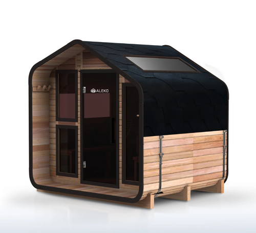 Right-side view of the ALEKO Bluet 6-person red cedar outdoor sauna with a black shingle roof and skylight.