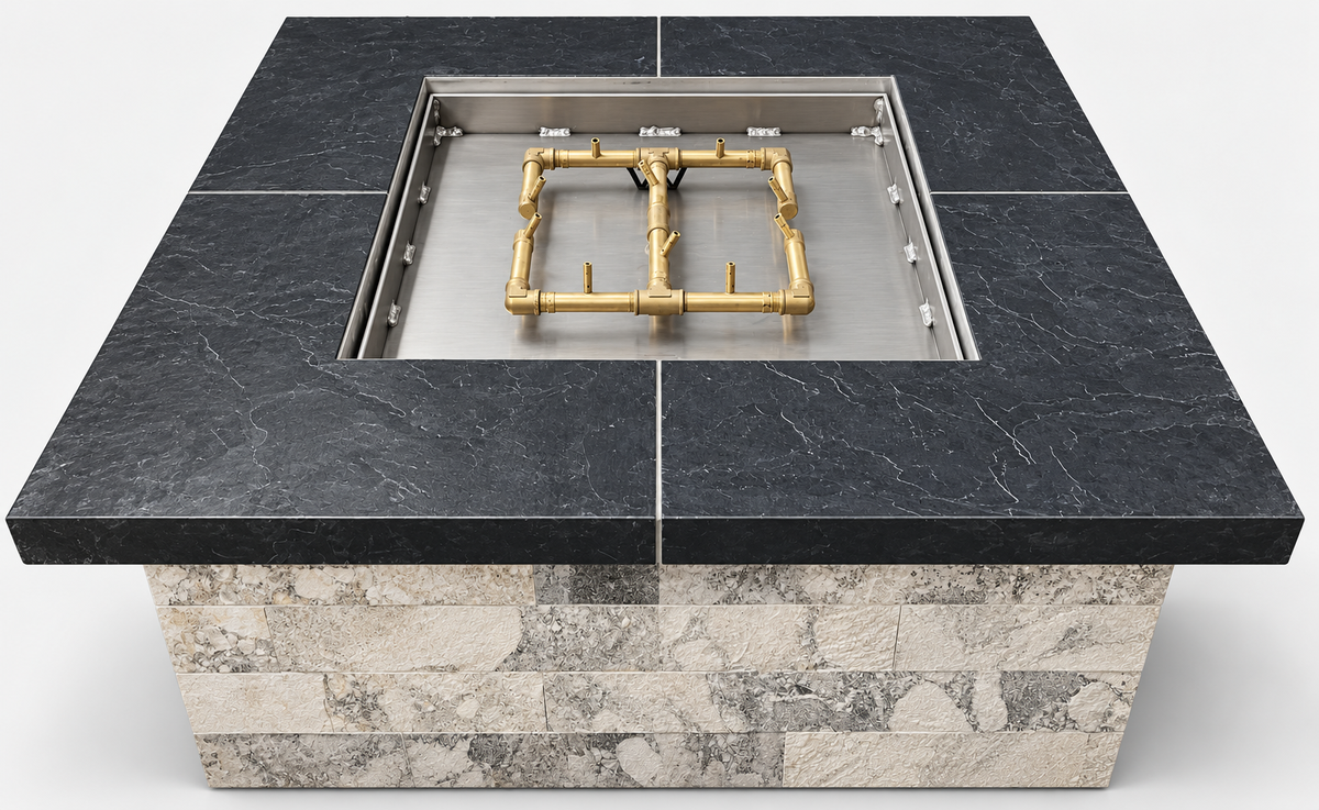 Firefly 36-inch square fire pit shown with burner pan and burner assembly installed in the finished enclosure