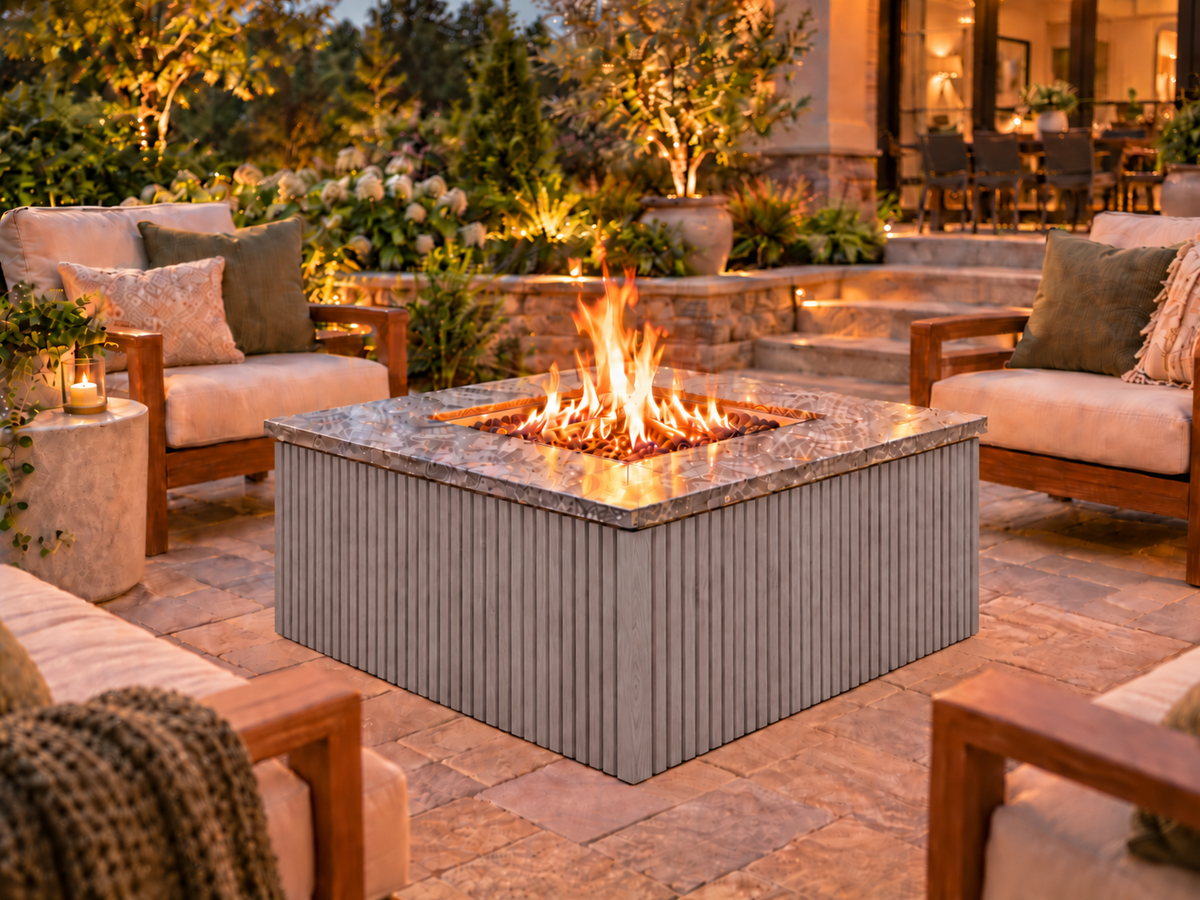 Firefly 36-inch square fire pit with Grey 2+2 cladding on a landscaped outdoor patio