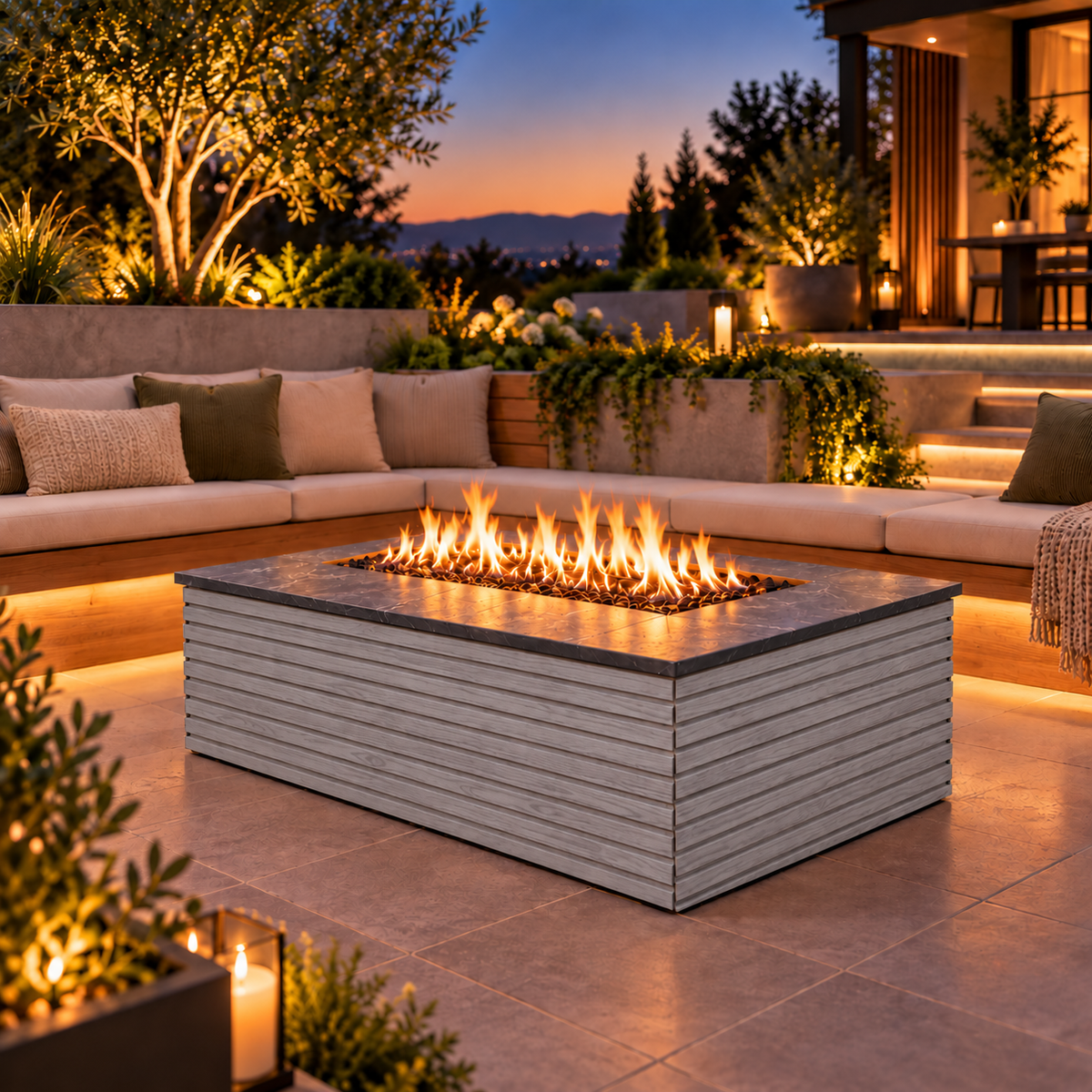 EZ Finish Firefly 48 x 32 rectangular fire pit with Grey 4+4 horizontal cladding on a landscaped patio at dusk.