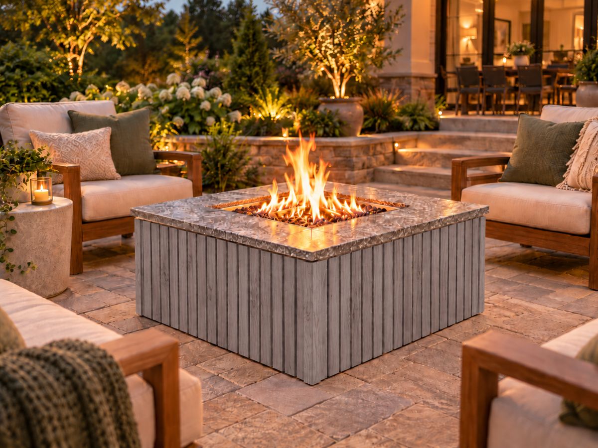 Firefly 36-inch square fire pit with Grey 4+4 cladding on a landscaped outdoor patio