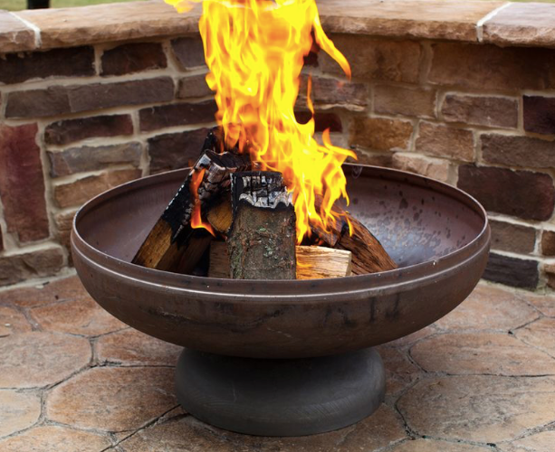 Ohio Flame Patriot fire pit burning wood on a stone patio
