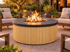 EZ Finish Firefly 48-inch round fire pit with Universal 2+2 aluminum cladding in Pine finish, shown lit in an outdoor patio setting.