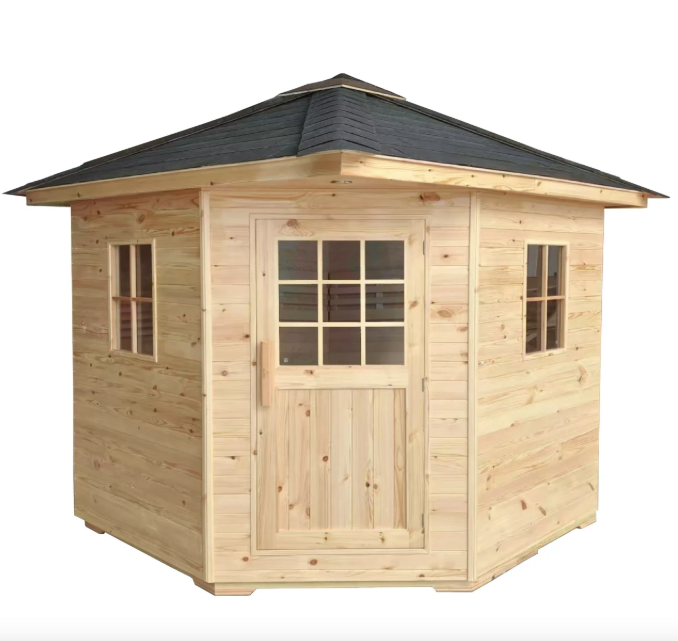 Front view of the outdoor Thermowood sauna featuring natural wood construction, paneled windows, and a weather-resistant shingled roof.